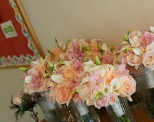 light pink, white and orange bouquets